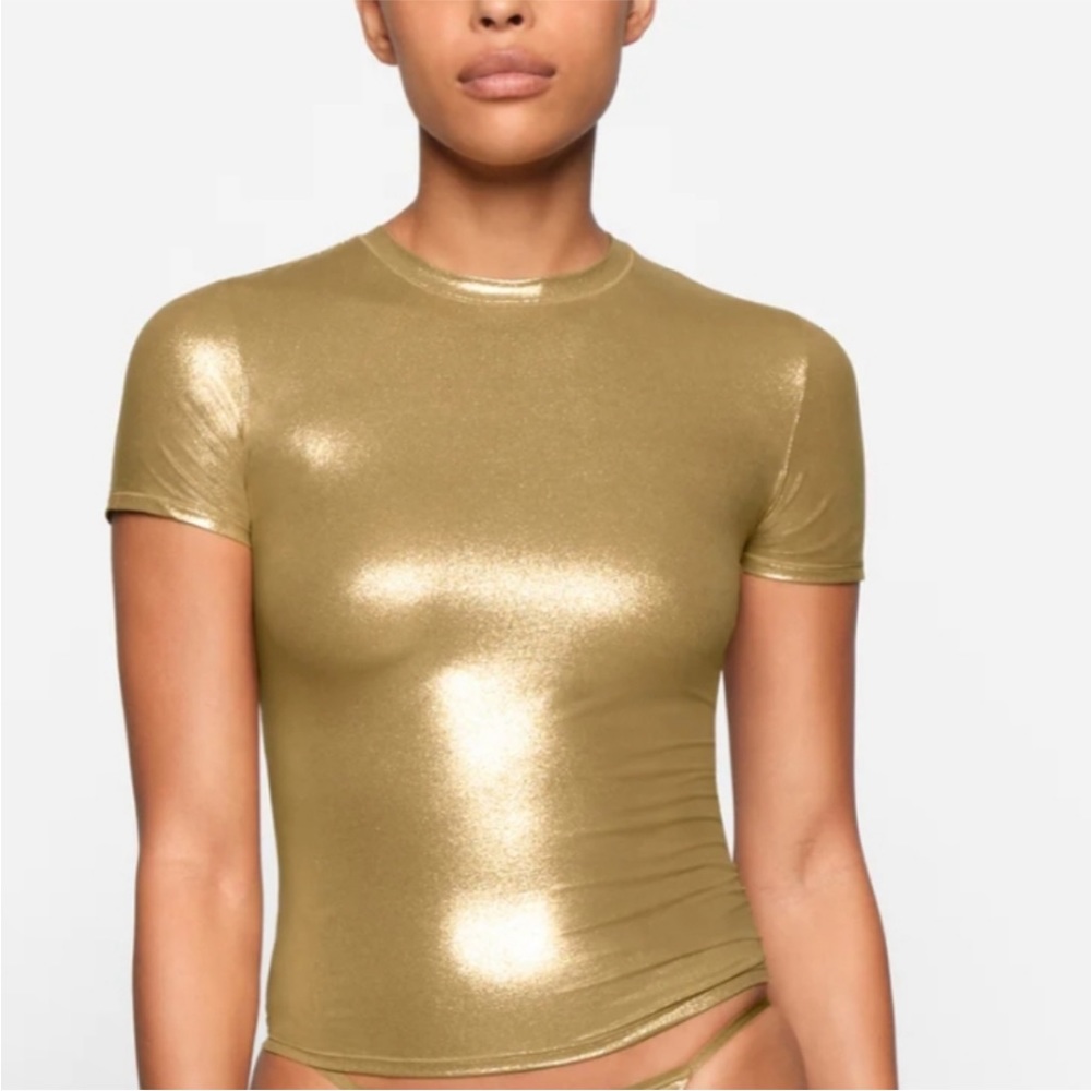 Skims gold short sleeve tee